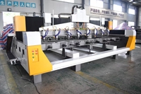 Máquina CNC de tallado de piedra rotativa de cuatro ejes estéreo y cabezales múltiples para cilindros