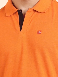 เสื้อยืดครึ่งแขนคอโปโลรุ่นพื้นฐานสีส้มมีสไตล์สำหรับผู้ชายสวมใส่สบายและจำเป็นสำหรับงานสังคม - Product Image 3