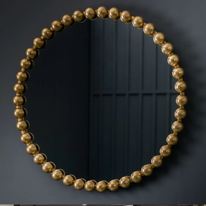 Miroir sunburst frappant avec des rayons métalliques ondulés, une pièce d'accent audacieuse et dynamique, disponible au prix de gros. - Product Image 4