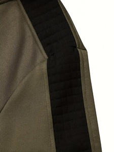 Haute qualité hommes vente douce coupe-vent Jogging survêtement ensemble fabriqué en usine étanche Nylon passepoil léger pour l'hiver - Product Image 2