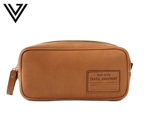 Kit de viaje impermeable con cremallera de cuero genuino ligero para hombre/mujer, Mini diseño de logotipo en relieve, neceser compacto resistente - Product Image 1