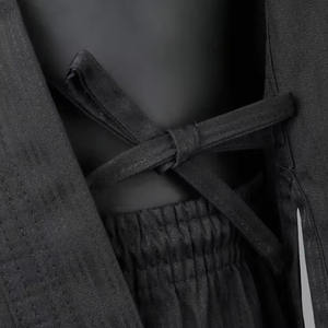 Vente en gros de vêtements d'arts martiaux en coton unisexe de haute qualité avec logo personnalisé tenues de karaté et uniformes de Taekwondo pour hommes et femmes - Product Image 6