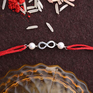 Rakhi Infinito Plateado con Roli Chawal, Joyería Tradicional y Cultural Coleccionable para Hermanos - Product Image 2