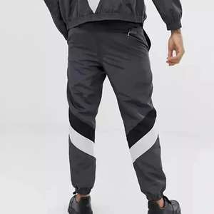 Ensemble de survêtement en nylon uni coupe-vent et respirant pour hommes et femmes, pantalon de jogging personnalisable unisexe - Product Image 6