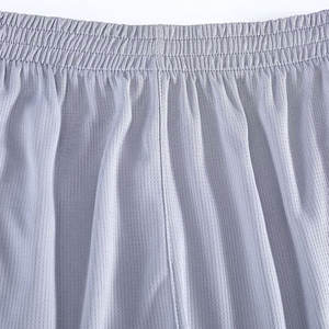 Ensemble d'uniformes de basketball personnalisés légers à manches courtes, style unique, couleur unie, respirant, 100 % polyester - Product Image 3