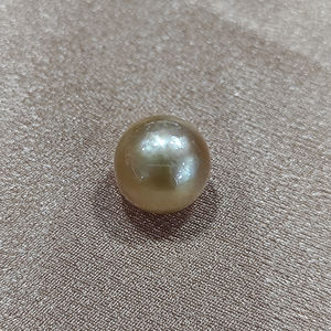 Esta exquisita perla marina dorada de 7-13 mm, de grado A en un lote, exuda una elegancia atemporal, con belleza natural y un encanto lujoso. - Product Image 6