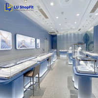Comptoir de présentation bleu pour bijoux, design intérieur populaire pour boutique de bijoux de mode