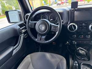 ข้อเสนอส่วนลด รถจี๊ป แรงเลอร์ อันลิมิเต็ด รูบิคอน 4x4 ปี 2015 มือสอง ไมล์น้อย - Product Image 6