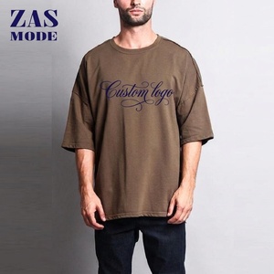 Camiseta unisex informal de manga corta con cuello redondo, 100% algodón, 230GSM, de peso pesado, estilo urbano, holgada y sólida, hecha en Bangladesh. - Product Image 1