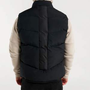 Man Jacket Mid Grey Gilet Modern Layering Piece with <b>Funnel</b> Neck, Functional Side Pockets and Versatile Styling for All Seasons - Product Image 3