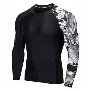 MMA Rash Guard Tops pour hommes Compression personnalisée Chemise à manches longues Rashguard haute performance pour l'entraînement BJJ Grappling - Product Image 1
