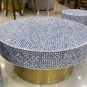 โต๊ะกาแฟทรงกลมลายดอกไม้สไตล์โมเดิร์น  ตกแต่งด้วยงานฝังลาย  เป็นมิตรกับสิ่งแวดล้อม สีขาว สำหรับใช้ในห้องนั่งเล่นที่บ้าน - Product Image 1