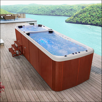 Piscine spa de nage extérieure en acrylique avec section de massage par hydro-jet Zone de baignade à débit d'eau Design ergonomique et éclairage d'ambiance LED