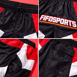 กางเกงขาสั้นวินด์เบรกเกอร์สไตล์เรโทรสำหรับผู้ชาย ผ้าโพลีเอสเตอร์ 100% ใส่สบาย เหมาะสำหรับวิ่งและเล่นกีฬา รับสกรีนโลโก้ - Product Image 6