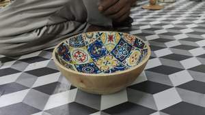 Un producto de utensilios de cocina hecho de madera de primera calidad utilizado para servir comida, conocido como tazón. - Product Image 6