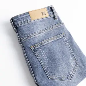 Jeans kurus pria, harga bagus, barang dalam stok berkelanjutan 2% spandeks + 98% katun ritsleting terbang dari produsen Vietnam