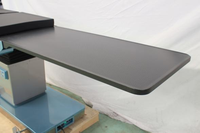 Table d'opération chirurgicale professionnelle en fibre de carbone radiotransparente compatible avec les systèmes de navigation et d'imagerie C-arm orthopédiques électriques, certifiée CE