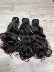 Offre d'usine : Extensions de cheveux ondulés naturels super doux, tissés, fabriquées à partir de cheveux humains vietnamiens bruts à 100 %, pour la vente en gros - Product Image 5