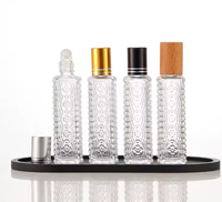 Botol Parfum Kaca Mewah Modern dengan Dekorasi Permukaan Embos, Ukuran Kustom 15ml 30ml 50ml 100ml