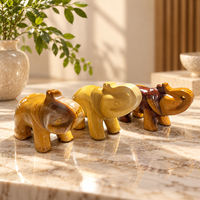Sculpture d'éléphant en calcite jaune, figurine d'animal en pierre précieuse dorée polie avec de magnifiques motifs pour la décoration intérieure et les cadeaux