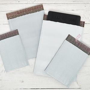 ซองไปรษณีย์กันกระแทกสีขาวทำจากโพลีเอทิลีนแบบเป็นมิตรกับสิ่งแวดล้อม ถุงพิมพ์ลายสำหรับจัดส่งสินค้าขนสัตว์ - Product Image 1