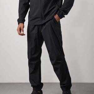 Pantalones Deportivos de Chándal para Hombre al por Mayor, Personalizados, de Cintura Media, de Poliéster/Nailon, con Cordón Ajustable y Logotipo Bordado - Product Image 1