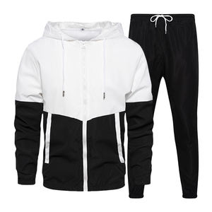 Gran oferta de chándal de poliéster personalizado para hombre, chaqueta y pantalones de chándal con cremallera de patrón sólido para deportes de invierno, conjunto de Jogger de dos piezas - Product Image 1