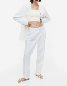 เสื้อกล้ามผู้หญิงสีพื้นปักโลโก้ - Product Image 6