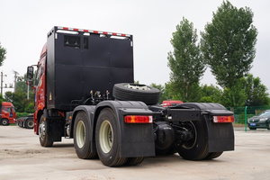 Camión Tractor Pesado FAWJ6 con Remolque de Plataforma - Product Image 4