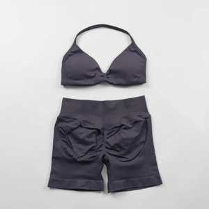 Sujetador deportivo de 2 piezas al por mayor, conjunto de yoga y pantalones cortos de realce de glúteos, conjunto de ropa de yoga y gimnasio personalizado de diseño sin costuras de calidad superior para mujer - Product Image 3