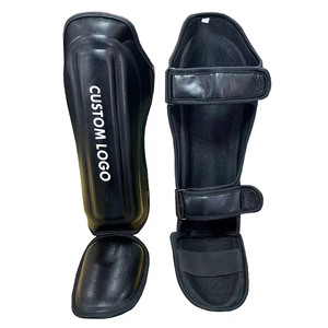 Protector de Espinilla de MMA y Muay Thai para Entrenamiento, Protección de Piernas de Alto Impacto, Equipo de Boxeo Protector de Cuero con Cierre de Velcro - Product Image 1