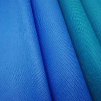 Rouleau de tissu non tissé de textile de 700mm médical 100% Sms/smms Spunbond pour le matériel non-tissé de tissu de robe chirurgicale jetable