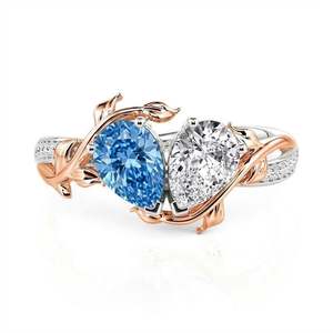 แหวนคู่แต่งงาน Jeulia Custom Two Birthstone Bypass ประดับเพชร สแตนเลสสตีล ดีไซน์ลายดอกไม้เก๋ไก๋ทันสมัย - Product Image 4
