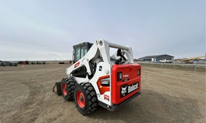 รถตักล้อยาง Bobcatts 5650 รถตักขนาดเล็กแบบ Skid Steer พร้อมถังสีขาว สำหรับงานก่อสร้าง - Product Image 2