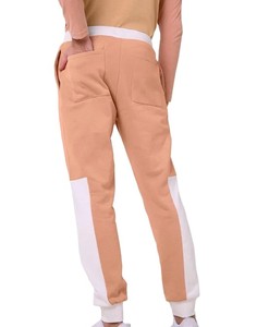 Pantalon de jogging pour hommes avec logo personnalisé de haute qualité avec tissu extensible à jambe fuselée et ourlet côtelé idéal pour le fitness et les vêtements décontractés - Product Image 2