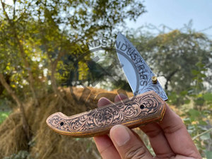 Prestigious Handmade Engraved Folding Pocket Knife D2 Steel Engraved Blade Handcrafted Leather Sheath Engraved Copper Handle - Product Image 5