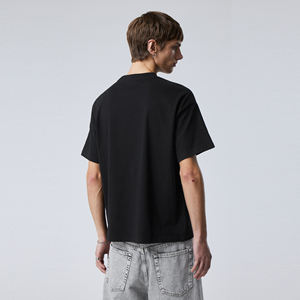 เสื้อยืดผ้าฝ้าย100% ใส่ได้ทั้งชายและหญิงเสื้อยืดคอกลมแขนสั้นถักทรงหลวมโอเวอร์ไซส์ดีไซน์แบบไหล่ตก - Product Image 2