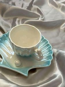 Taza de cerámica de diseño moderno de lujo para el hogar, hotel y restaurante, taza de café y té de mesa de forma redonda de Color blanco - Product Image 5