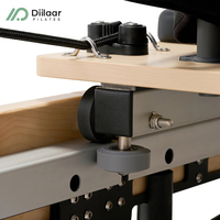 Reformer Pilates pliable en érable avec mécanisme de pliage rapide et machine de Pilates Reformer