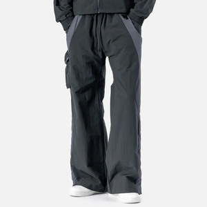 Pantalon parachute homme léger, coupe ample personnalisée, avec cordon de serrage, poches cargo en nylon, style empilé, prix de gros - Product Image 1
