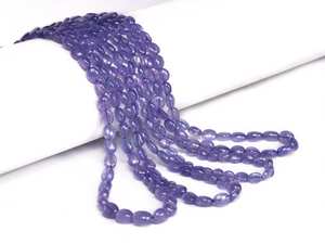 Perles de pierres précieuses en vrac de forme ovale de tanzanite de qualité supérieure 4-7.5mm perles de tanzanite naturelle pour la fabrication de bijoux au prix de gros - Product Image 6