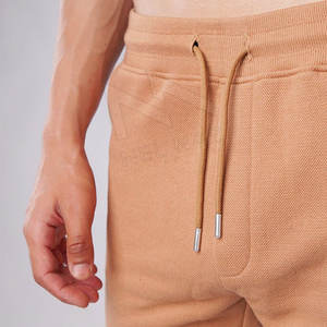 Pantalon oversize taille moyenne décontracté pour hommes Logo personnalisé Coupe ample Style sport Streetwear à prix raisonnable - Product Image 4