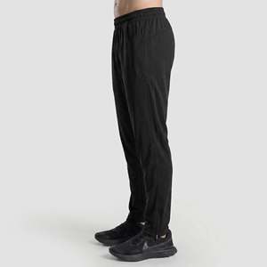 Momentum Regular Fit Track Pants in Black Breathable Design - Product Image 1