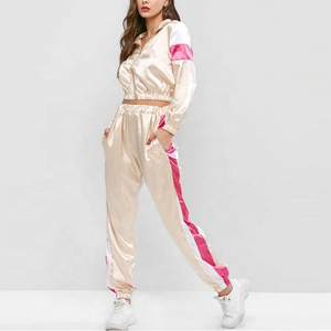 ขายส่งเสื้อแจ็คเก็ตและกางเกงครอปซิปแบบกําหนดเองชุดกันลมชุดไนลอนโพลีเอสเตอร์สองชิ้นชุดวอร์มชุดกันลมสําหรับผู้หญิง - Product Image 3