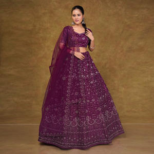 Majestic Heavy Embroidered <b>Net</b> Lehenga Choli with Shimmer Thread Detailing and Matching Dupatta for Wedding Party Wear - Product Image 1