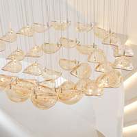 Lustre en verre flottant nordique personnalisé, luminaire suspendu LED chromé pour salle à manger, villa, hôtel, escalier, hall