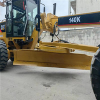 Niveleuse Caterpillar 140K d'occasion, modèle 2020, avec moteur, boîte de vitesses et pompe, à vendre