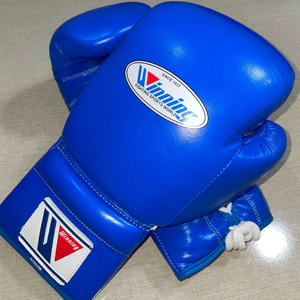 Fabrication OEM de gants de boxe en cuir de qualité supérieure, 100% cuir de vache véritable, à lacets, bleus, gants de boxe Winning - Product Image 4