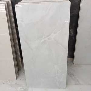 Satvario 60x120 Finition brillante Carreaux de porcelaine blanche Salle de bain moderne Poli Qualité d'exportation Prix réduit Fait à la main Inde - Product Image 3