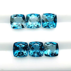 หินโทแพซสีฟ้าเข้มตัดเหลี่ยมเพชรพลอยขนาด6มม. ถึง10มม. รูปทรงเบาะอัญมณีบุษราคัมสีน้ำเงินเข้ม - Product Image 1